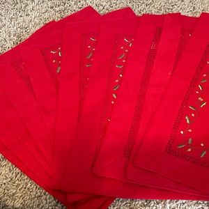 Set of 10 used fabric placemats- red with Holly border